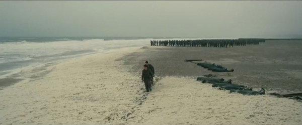 Dunkirk, hero with stretcher on beach