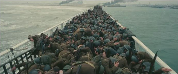 Dunkirk, soldiers ducking, ships background