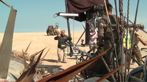 Miller directing in desert